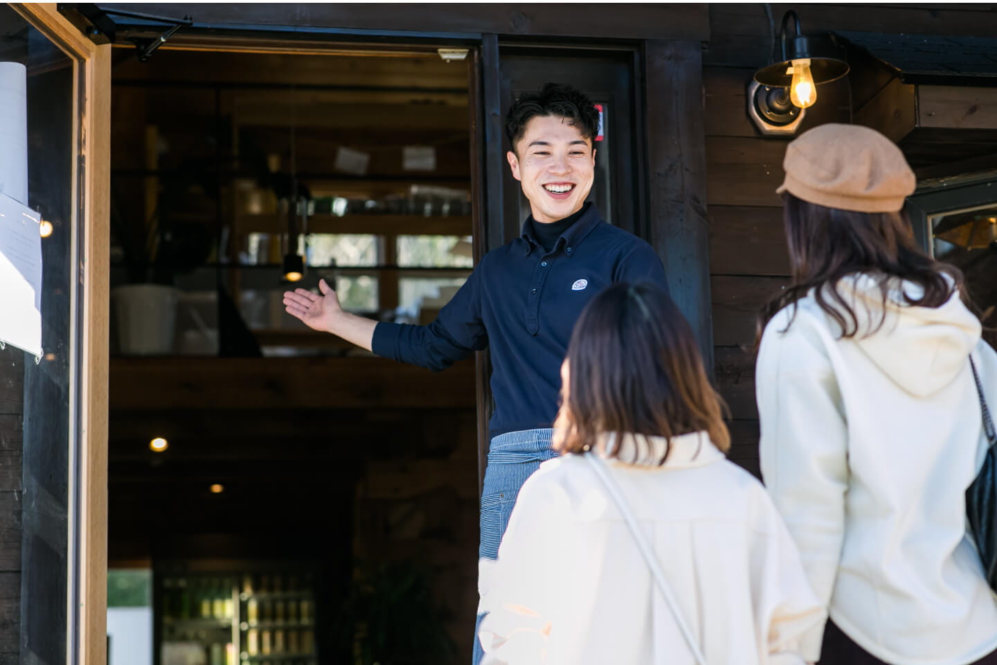 Photo of staff guiding customers