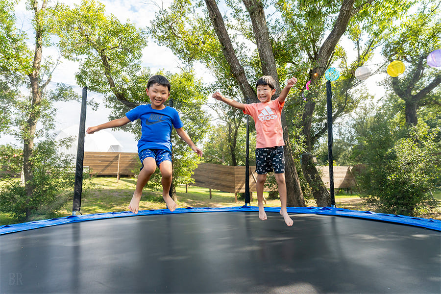 Children playing on a trampoline