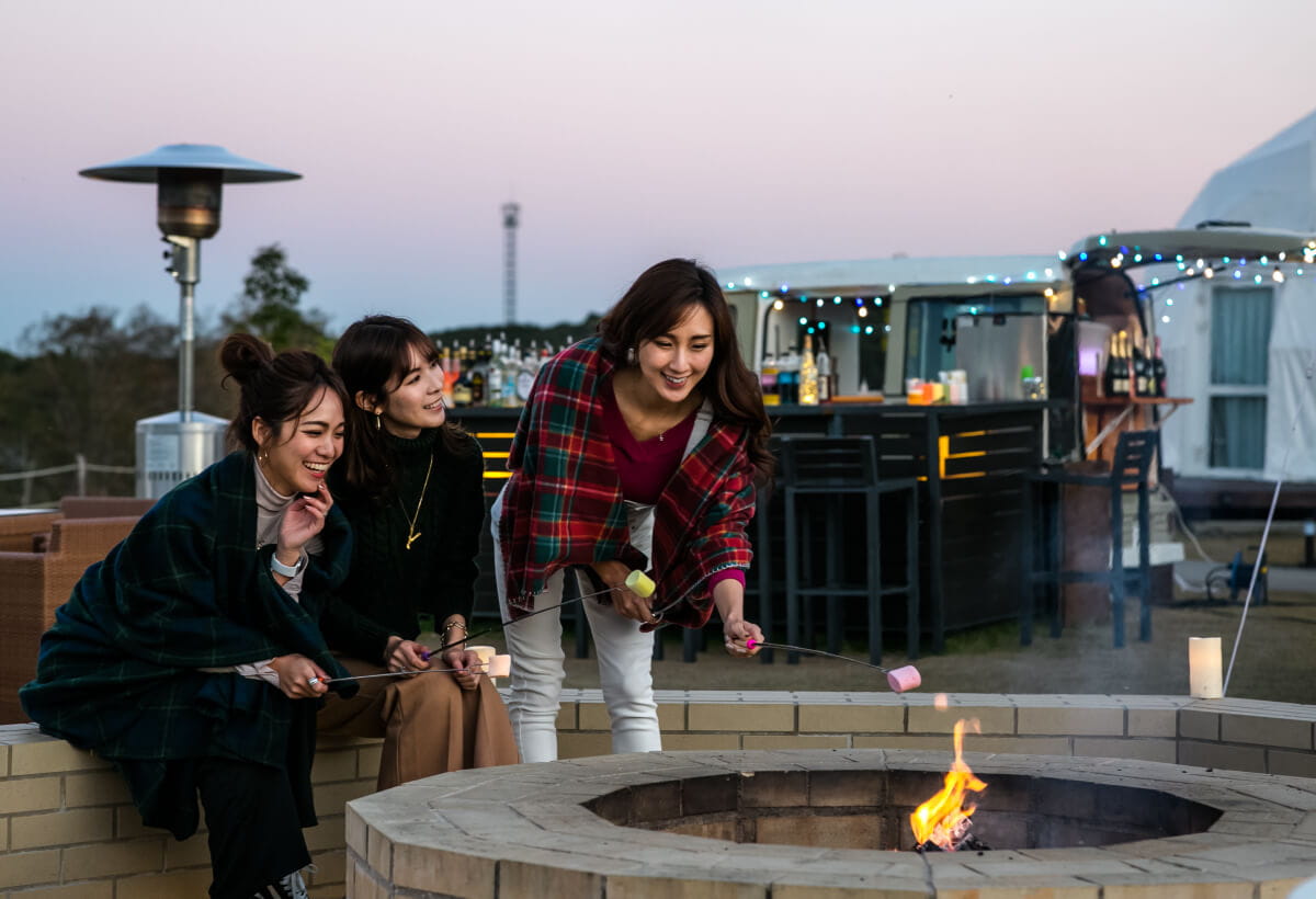 
Photo of women enjoying roasted marshmallows